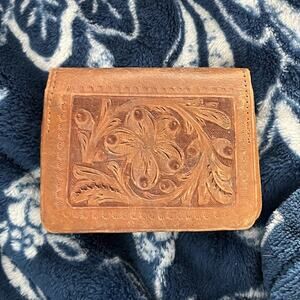 1898 Antique hand-tooled Leather billfold wallet featuring a floral pattern